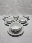 Jogo de 6 xícaras de chá em porcelana Argentina Verbano com guirlanda floral e friso ouro. Medindo 10,5cm x 5cm de altura.