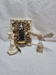 Lote sacro, composto de imagens, sendo em porcelana, madeira, cerâmica. Medindo o maior 24cm x 19cm.