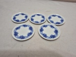 Jogo de 6 descansos de copo em porcelana floral. Medindo 8,5cm de diâmetro.
