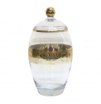 CRISTAIS- Delicada bomboniere em cristal translúcido, com decoração de guirlandas com farta douração. Pega no formato de bola. Apresenta selo na base CREAZION ESCLUSIVA CARBOMBONIER FIRENZE/ MADE IN ITALY. Medidas 26A X 14D. Em bom estado.