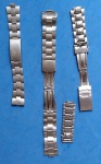 Relógios - 3 pulseiras de aço , sendo uma  original da Technos e demais de marca menos conhecida , otimas para consertos ou equipar relogios antigos