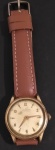 Relogio - marca Universal GENEVE !! Antigo !! plaker de OR !! marca suiça !! pulsira de couro marrom  !! acervo de colecionador !! funcionando , foi revisado !!