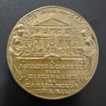 Medalha Comemorativa, Homenagem ao Centenário de Nascimento de  Augusto G. Girardet - Seus Discípulos da Casa da Moeda do Brasil, Data 1855 - 23/11 - 1955, Gravador L.Campos, Bronze, Peso 84 g, Diâmetro 50 mm, Quantidade Cunhada 200 Medalhas, Flor de Cunho.
