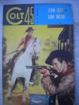 Gibi - COLT 45 - Nº 19 - Sem data - Editora Ediex - formato 16 X 23 cm <<<<< Apresenta: Foto quadrinização do filme COW-BOY SEM MEDO. com Ken Maynard >>>>> Muito bom estado de conservação, contendo 52 páginas. Um micro furo de cupim. Leves desgastes junto a borda direita (veja imagem).