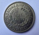 Americana - MAÇONARIA - MAÇONIC HOME - MARYLAND - ONE PENNY - 11 NOVEMBRO DE 1929 - Diâmetro 3 cm - Borda Lisa <<<<<< SECOND BONNIE BRINK CORN HHUSKING >>>>>>> Flor de cunho - OBS. Não está claro se a moeda é circulante, ou se trata de uma comemoração da Maçonaria