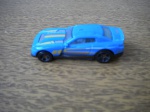Carro em miniatura - D-MUSCLE 2014 - Em metal, com as rodas em borracha, Cor azul e rodas pretas - Dimensões: 7,00 X 3,00 cm - Ótimo estado de conservação -  Fabricado em Malásia, com procedência dos Estados Unidos