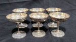 WOLFF - LOTE COM SEIS TAÇAS DE SOBREMESA EM METAL ESPESSURADO A PRATA. MEDINDO 11 X 9.5 CM