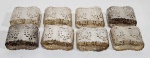CONJUNTO DE SEIS PORTA GUARDANAPOS EM METAL ESPESSURADO A PRATA. MEDINDO 2.5 X 4.5 X 6 CM
