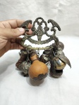 Linda penca baiana com 9 balangandãs em metal prateado. Medindo 11cm x 19cm.