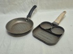 Lote composto de frigideira redonda em alumínio e frigideira multifuncional 2 buracos de ovo. Medindo a maior 17cm x 17cm x 2cm de altura.