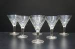 Seis taças para champagne em fino cristal translúcido, lapidado com folhagens. Alt. 15 cm.