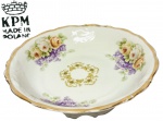 Krister Porzellan-Manufaktur - KPM - POLÔNIA - Raro e belíssimo prato de serviço / centro de mesa, executado finamente em porcelana de excelente qualidade e manufatura, adornado por linda ornamentação floral e ricos filetes á ouro. Perfeito estado de conservação, mede 6 cm de altura x 19 cm de diâmetro da borda. Polônia meados do Século XX.