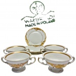 WALBRZYCH - POLÔNIA - Raríssimo e lindo jogo de 4 xícaras Consommé com 4 pratos rasos. Peças executadas em porcelana de excepcional qualidade e renomada manufatura. Adornadas por riquíssimo trabalho em relevo com coberturas á ouro. Perfeito estado de conservação. Pratos medem 17,5 cm de diâmetro e xícaras 6 cm de altura x 11 cm de diâmetro da borda cada. Polônia meados do Século XX. Oportunidade.
