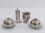 Conjunto com quatro peças em metal prateado sendo: par de mantegueiras, base em vidro redondo, tampa em metal ( 10 x 8 cm alt), dois paliteiros em dois modelos um no formato de ânfora ( 8 cm alt) e com tampa marcado Eberle ( 12 cm alt)