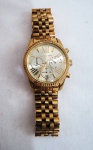 MICHAEL KORS-  Lexington MK5556 Womens Watch , confeccionado em metal na cor dourado. Funcionando. Med. 4 cm, pulseira curta com 13 elos .