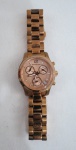 MICHAEL KORS-  modelo 5430, aço inoxidável rosé, cronógrafo com três sub mostradores e calendário de dias. Funcionando. Med. 3,5 cm diâmetro.
