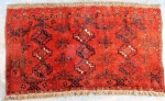 Tapete Bokhara. Med. 1,45 x 0,85 cm. Com restauro.