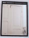 ESPELHO, um (1) retangular bisotado, estrutura em ferro forjado. Med. 54 x 42 cm.