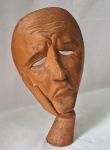 BALI- Máscara em madeira entalhada representando" Figura ". Med. 26 cm alt.
