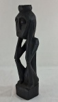 Escultura Icônica Africana, Contemplação, em madeira ebanizada. Med. 32 cm alt.