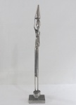 ALÚMEN DESIGN- Escultura em aluminio polido representando " Nativa Africana". Selado. Med. 44 cm alt.