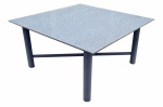 Mesa com tampo de granito quadrangular apoiada em pernas de ferro cilíndricas patinadas na cor grafite arrematadas em trava, (Esta peça  encontra-se no Calembe - Petrópolis), 147 x 147 x 74 cm.