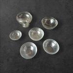 Seis peças em cristal translúcido sendo 5 bowls e 1 compoteira sem tampa, Diam. 17, Alt. 8  a Diam. 11, Alt. 5 cm.