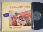 LP GRANDMASTER FLASH & THE FURIOUS FIVE - THE MASSAGE // CAPA CONFORME FOTOS // DISCO EM MUITO BOM ESTADO // PODE CONTER RISCOS QUE CAUSAM CHIADOS, RUÍDOS OU PULOS