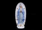 Nossa Senhora de Guadalupe - imagem sacra em porcelana vitrificada e policromada com realces á folha de ouro, med. 31x13x9 cm.