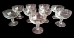 Nove taças em cristal  translúcido, para Champangne/sobremesa , estilo coupe, com pé canelado,  lapidada com decoração de ramas.