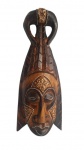 Máscara tribal esculpida em bloco de madeira. Medida 31 cm de altura.