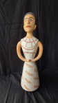 Maria Aparecida Garrafa em cerâmica pintada 66 x 23 x 18 cm identificada na base leve perda na borda da tampa