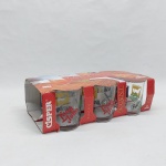 Seis copos para uísque em vidro translúcido decorado com rótulos de diversos uísques. Alt. 8,5 cm.