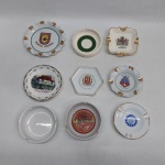 Nove cinzeiros em porcelana branca. Decoração e procedência diversas. Dois com lascados. Diam. 10 a 13 cm.