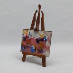 M. GONÇALVES - "Abstrato", acrílico s/ papel, med. 9 x 12 cm. Assinado e datado 1981. Moldura na forma de cavalete de pintura. Alt. 22 cm.