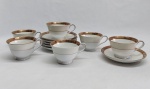 NORITAKE - Seis xícaras para chá com respectivos pires, porcelana japonesa decorada com faixa creme, borda em ouro brunhido e canetado em preto com flores e folhagens. Marca da Manufatura no fundo.
