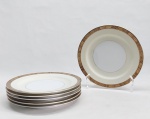 NORITAKE - Seis pratos para sobremesa em porcelana japonesa decorada com faixa creme, borda em ouro brunhido e canetado em preto com flores e folhagens. Marca da Manufatura no fundo. Diam. 19cm.