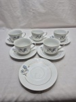 Jogo de 5 xícaras de chá em porcelana Steatita floral com friso ouro. Medindo 9cm x 6,5cm de altura.