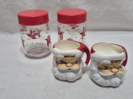 Lote de 2 potes em vidro com motivos natalinos e 2 canecas em porcelana na forma de Papai Noel. Medindo a caneca 8cm x 8cm de altura, potiche 8,5cm x 13cm de altura.