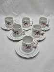 Jogo de 6 xícaras de café em porcelana Renner floral. Medindo 5cm x 5cm de altura.
