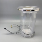 DIVERSOS - Champanheira em acrílico com suporte em metal.