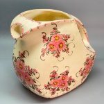 FAIANÇA - Antiga jarra d' água em faiança. Med. 18x21x11 cm.