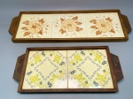 DIVERSOS - Lote de 2 bandejas em madeira com fundo em azulejo antigo, modelos diferentes. Med. 57x16 cm e 52x17 cm.