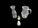 Quatro peças em vidro, uma jarra, 1 decanter e saleiro e pimenteira, Alt. 21 e 23 cm.