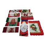 Nove peças  com motivos Natalinos sendo 5 panos para bandeja, 2 toalhas de copa e 1 pano de prato e um caminho de mesa 97 x 30 (o caminho com leves marcas de guarda).