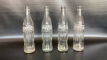 Garrafas de coca cola em vidro  anos 70/80 lote com 4 unidades 24cm 6cm diâmetro. com marcas do tempo. consultar as imagens.