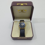 Rélogio de Pulso, Marca Technos WR, Pulseira em Couro, Na Caixa Original, Não testado o Funcionamento. Medidas da Caixa: Altura: 5 cm, Largura: 9 cm, Comprimento: 9 cm, Peso Tota: 170 g.