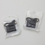 Lote com 2 Carregadores Duplos de Bateria USB, Modelo 501, Na Embalagem, Sem Uso, Não testado o funcionamento de Nenhum. Medidas de Um: Altura: 14,5 cm, Largura: 1,5 cm, Comprimento: 10 cm, Peso Total: 70 g.