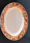 Travessa em porcelana inglesa J&G Meakin., decorada com folhas em tons de laranja e marrom. - Medias: 29x22