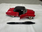 BRINQUEDO ANTIGO MINIATURA DE CADILLAC VERMELHO E PRETO.